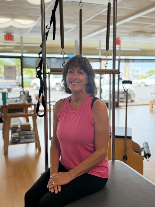 Dena L., certified instructor at Love Pilates